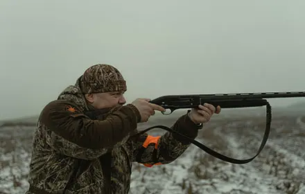 shooting a prey with rifle scope