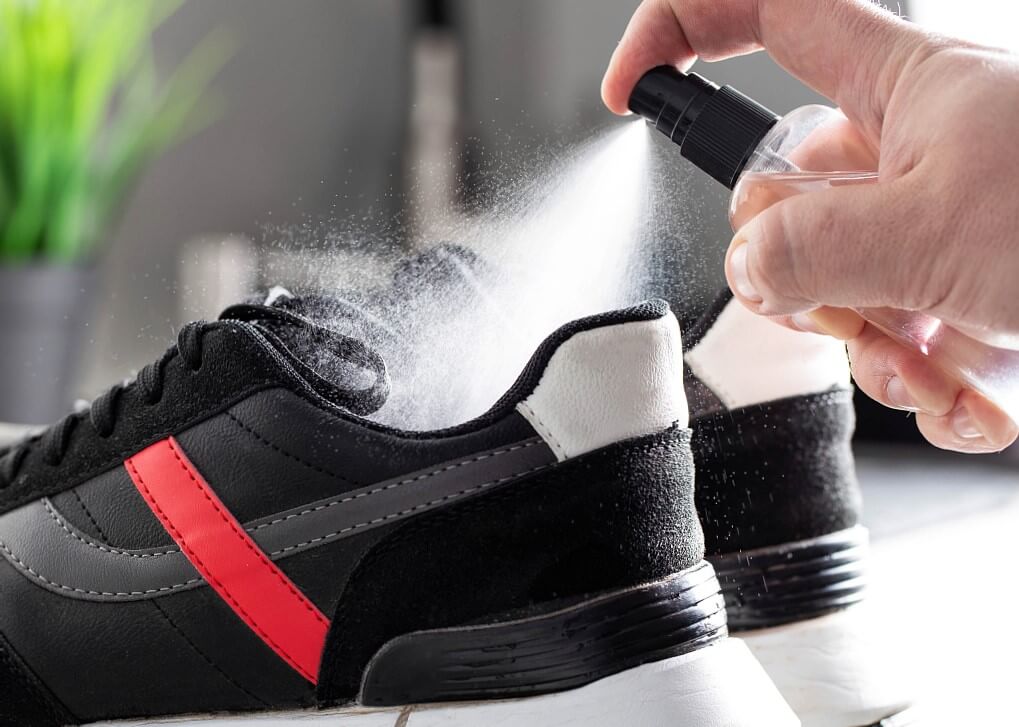 use bottle spray to clean shoe insoles