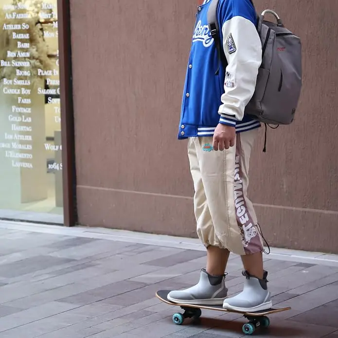 Man wearing sport ankle deck boots for outdoor activities