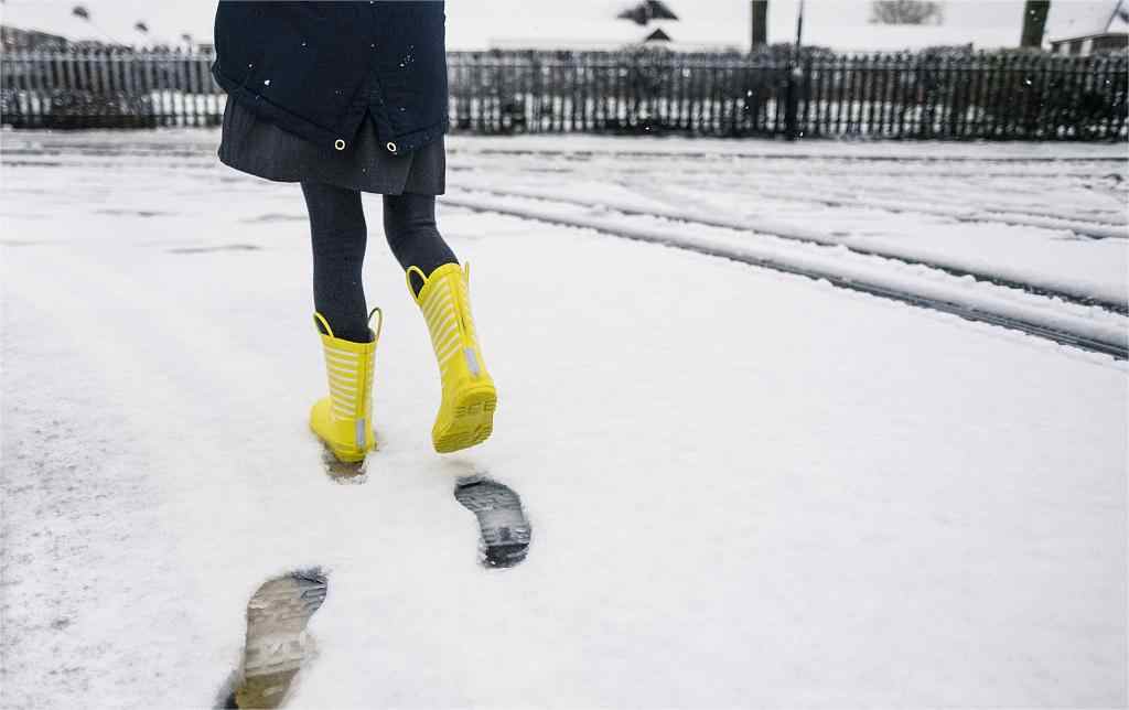 wearing rain boots in the snow