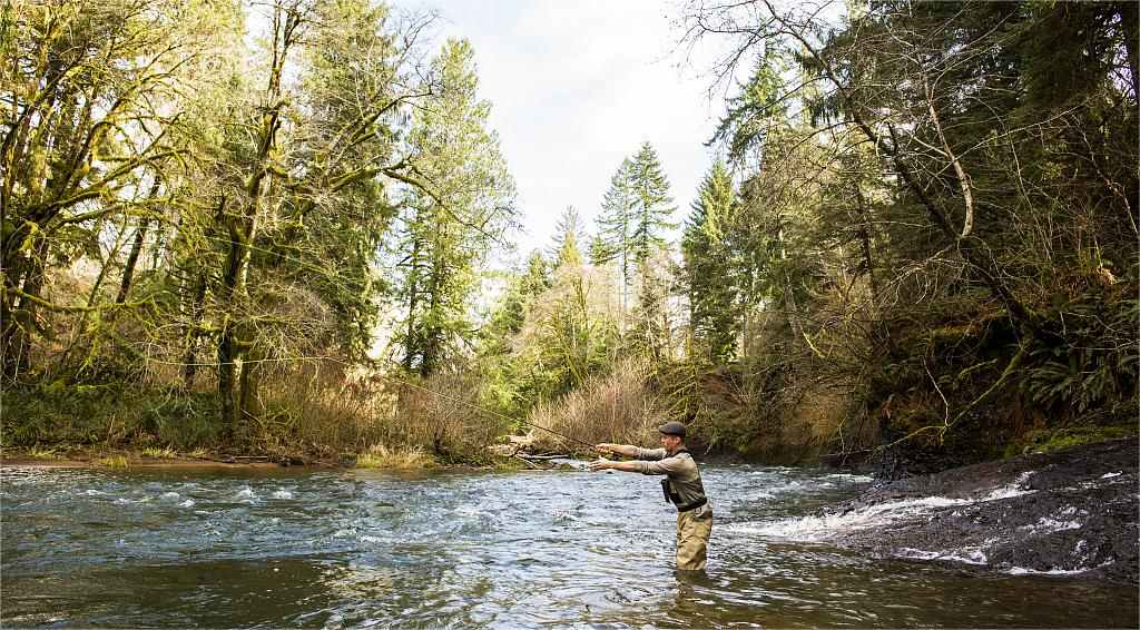 wearing waders when fly fishing