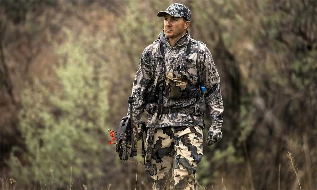 hunter is wearing camo clothing