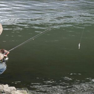 a fisherman is fishing in Wisconsin lake