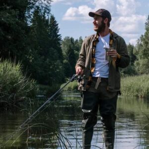 a fisherman is fishing in a river in Washington