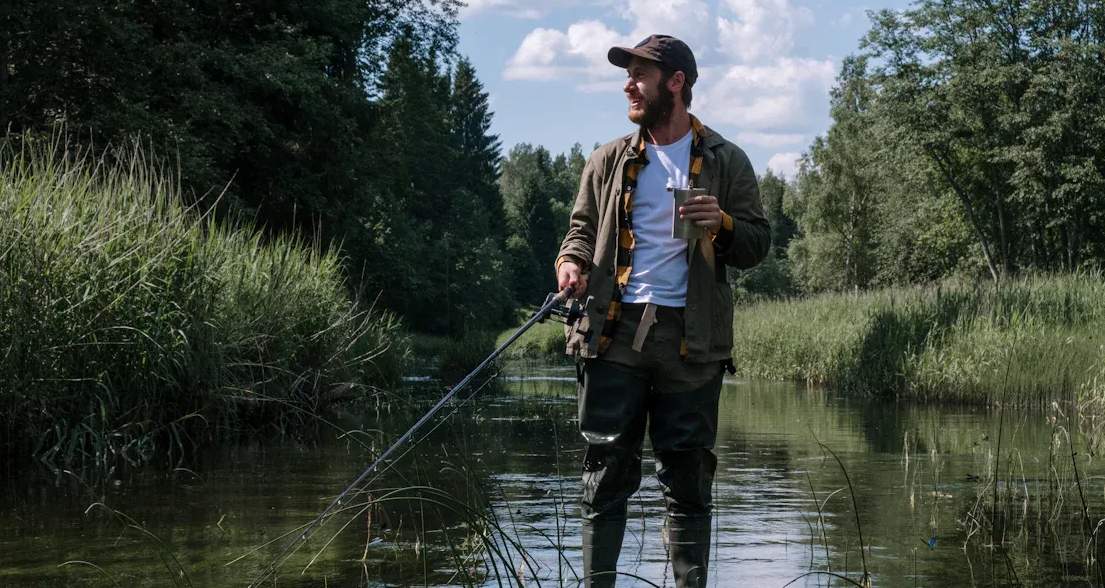 a fisherman is fishing in a river in Washington
