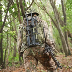 a hunter is carrying the Kalkal dual-step sticks for treestand hunting