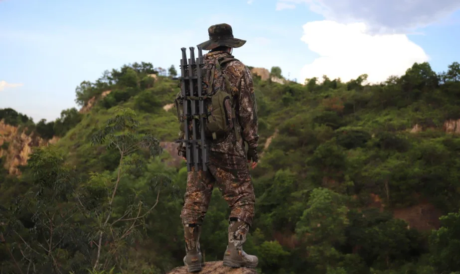 a hunter carry Kalkal hunting sticks and head to the field
