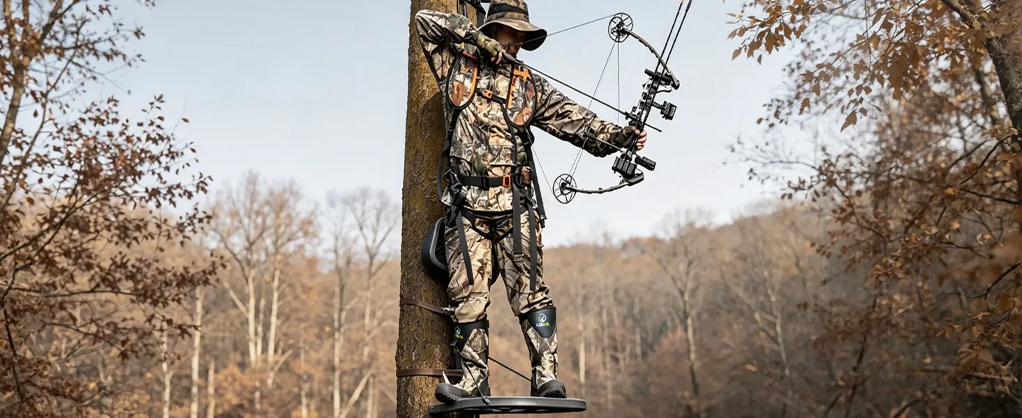 Bow hunter taking a shot from an elevated fixed position stand