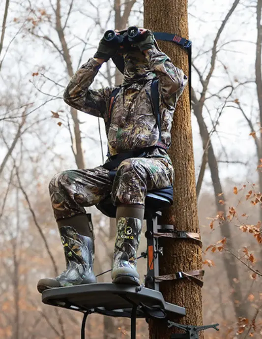 hunter uses Kalkal tree stand hunting system to hunt from above