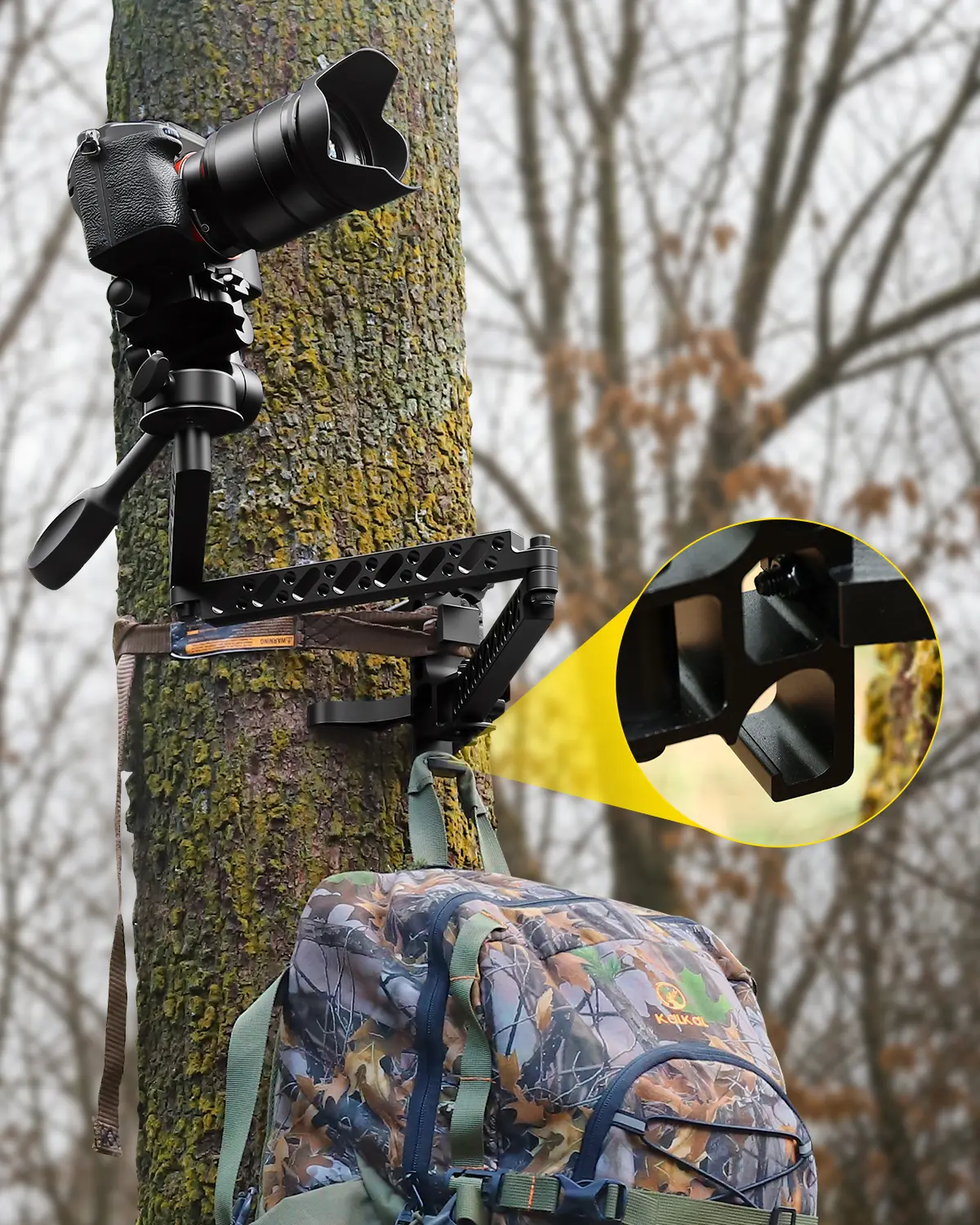 Built-in accessory hook on a hunting camera arm for hanging small gear