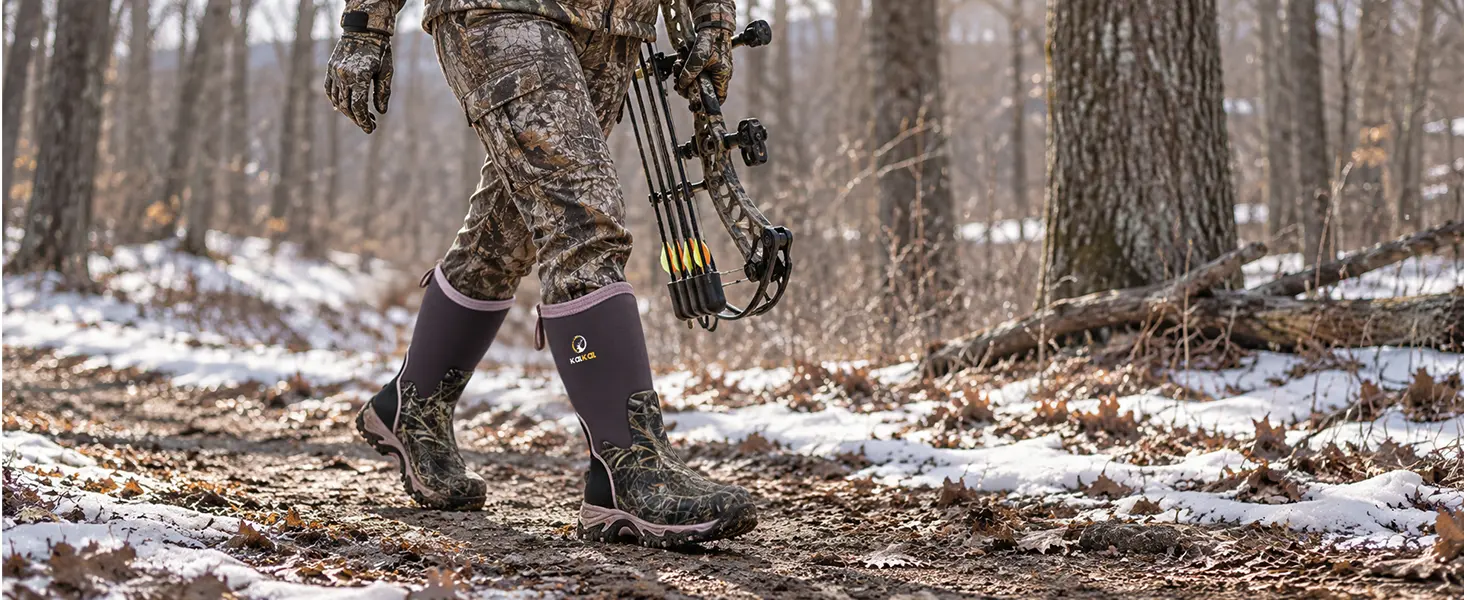 Woman walking along a woodland trail camouflage mid-calf hunting boots
